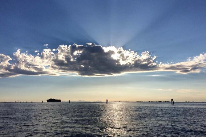 Aperitif at sunset in the Venice lagoon on a private boat. - Stop 1 at Arsenale di Venezia: shipbuilding power from the water