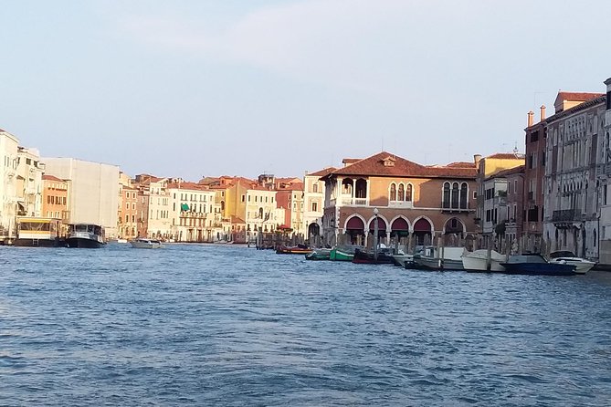Grand Canal boat tour and Murano glass experience with Hotel pick up - Timing, routing, and the included return by public boat