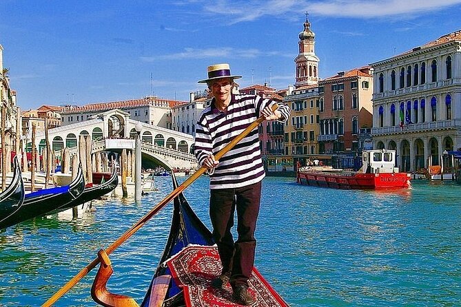 Magical Gondola Journey: Explore Venice's Grand Canal in Style! - A canal stop with food history: seafood names and lagoon work
