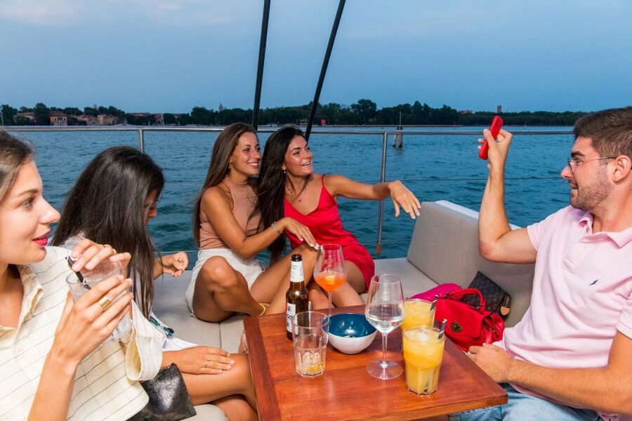 Venice: Lagoon Catamaran Cruise with Music and Drinks - Getting to the boat: Riva dei Sette Martiri and big red sails