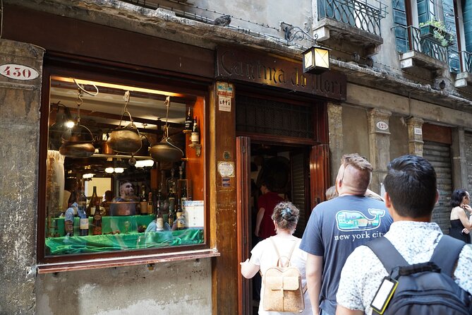 Venice Like a Local: Food, Wine & Spritz Tour with Traghetto Ride - Rialto market energy and the backstreets that feel like Venice