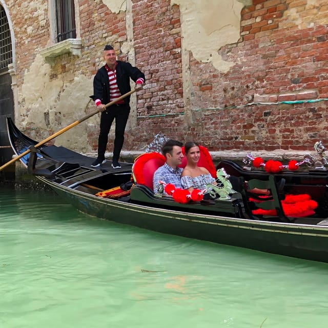 Venice: Private Grand Canal Gondola Ride from Rialto - Rialto Bridge From the Water: Old Stone, Perfect Angles