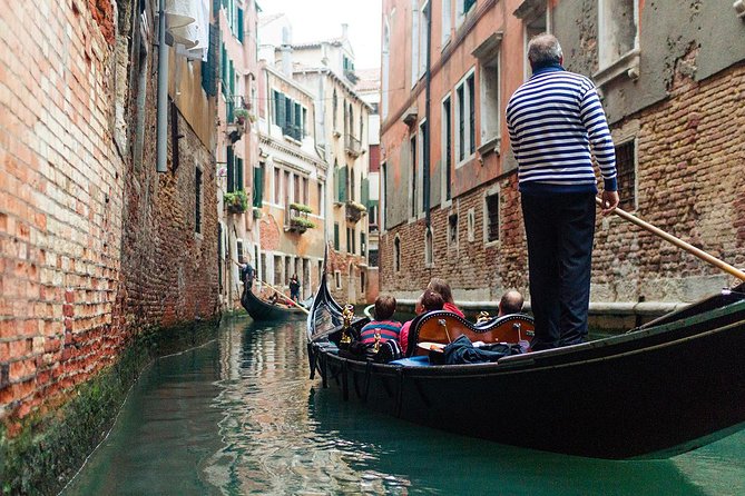 Welcome to Venice Group Tour St. Mark's Basilica & Gondola Ride - A tight Venice route from Rialto to St Mark’s Square